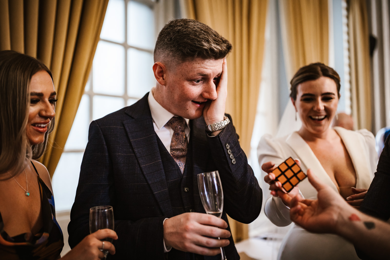 Wedding guest with shocked reaction to magic