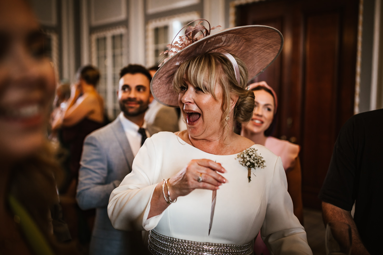 Mother of the bride being entertained by magician