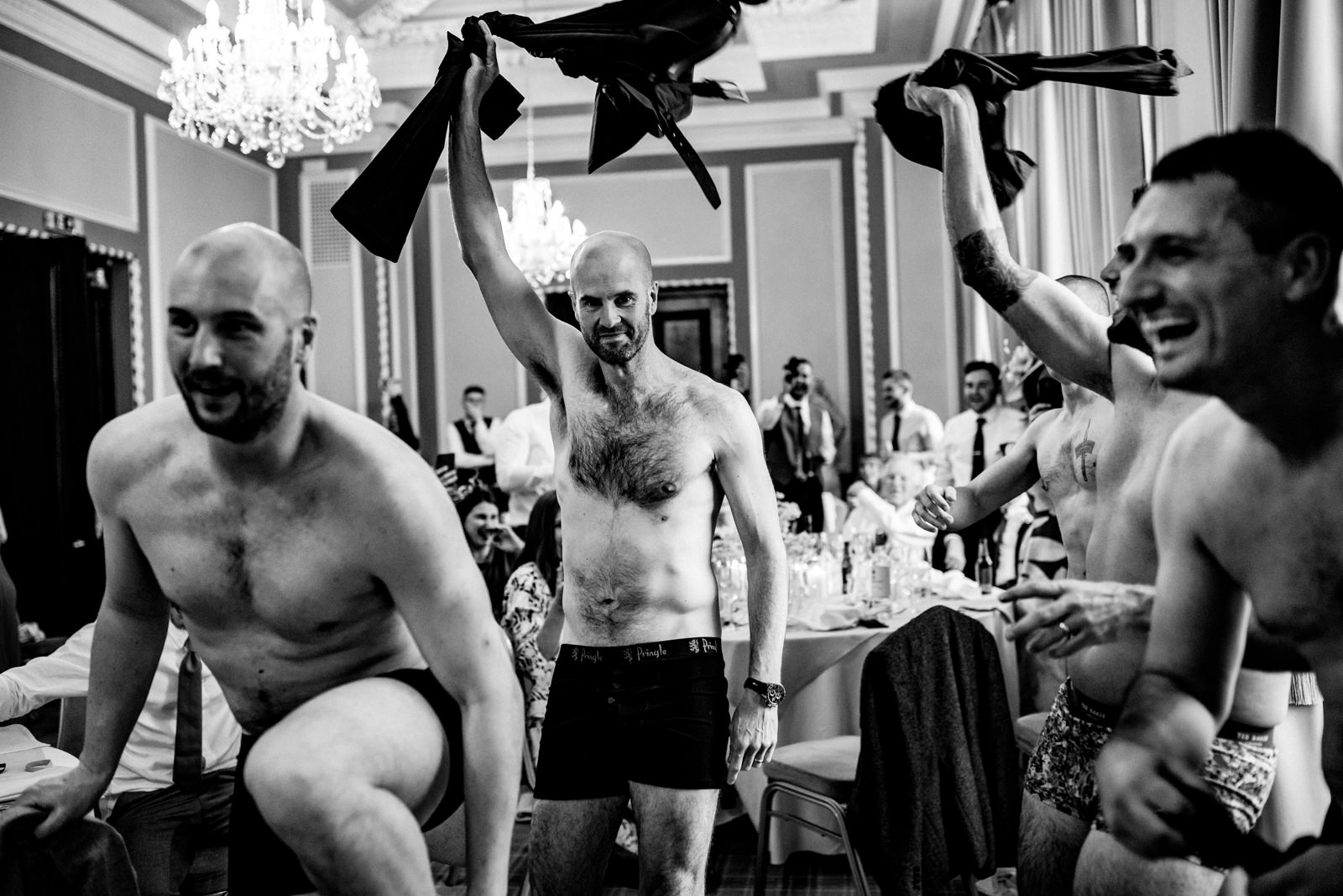 Guys taking off their clothes at Manchester Hall