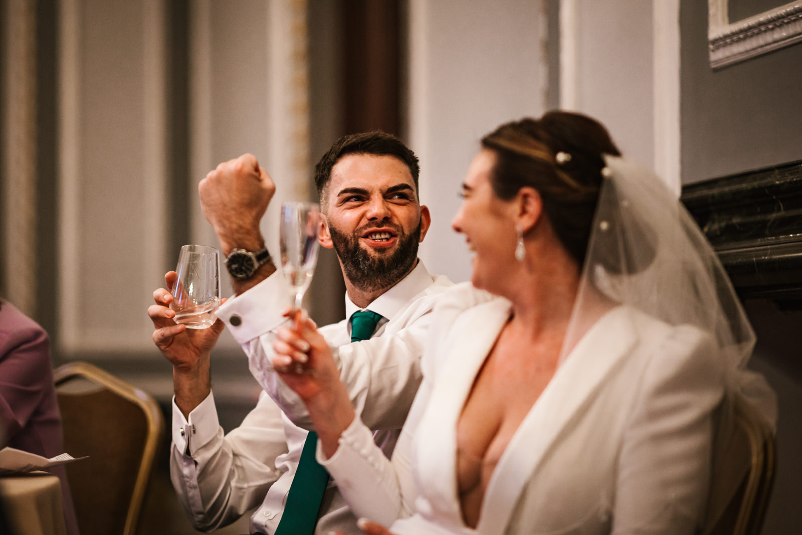 Groom showing his fists during speeches