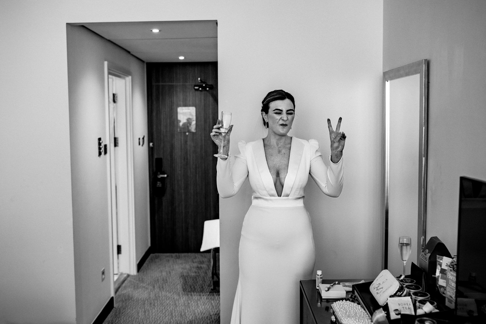 Cool bride giving peace sign