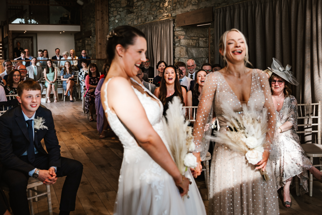 Wedding guests laughing