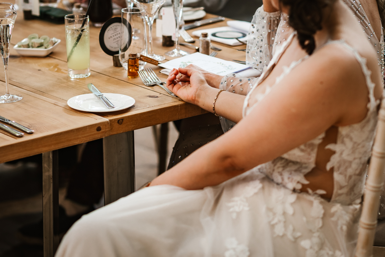 Brides holding hands