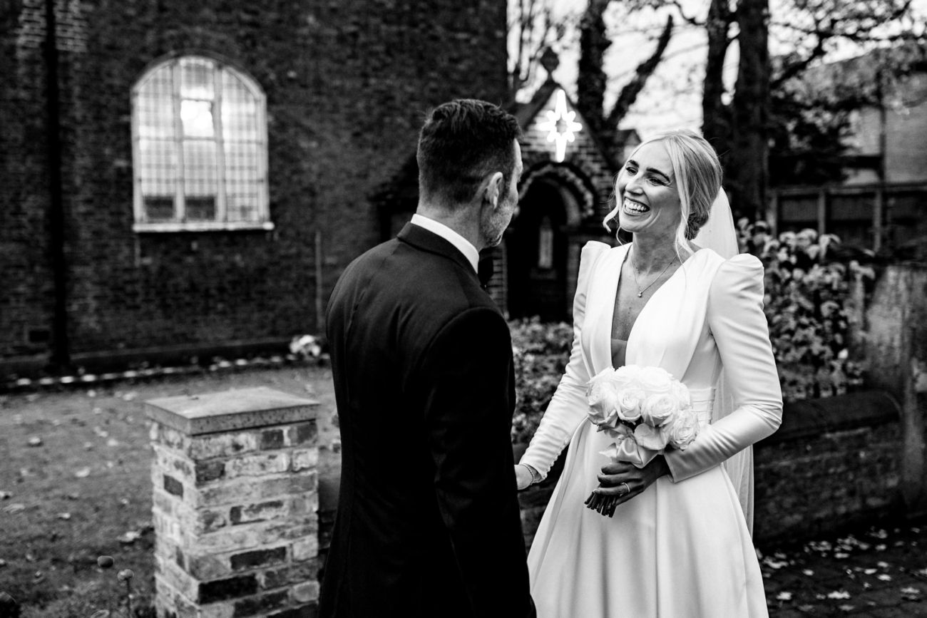 Bride and groom outside church