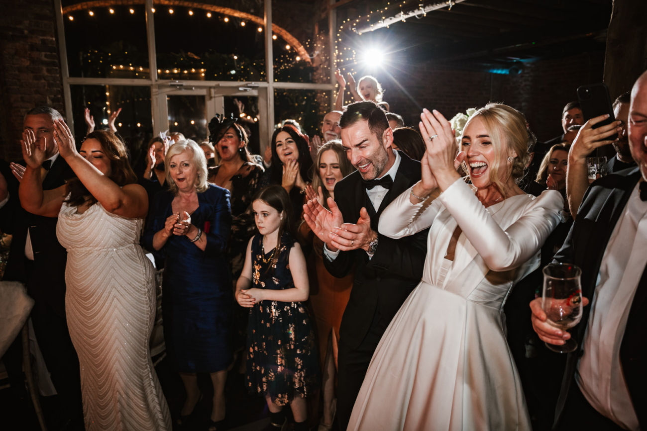 Wedding guests clapping