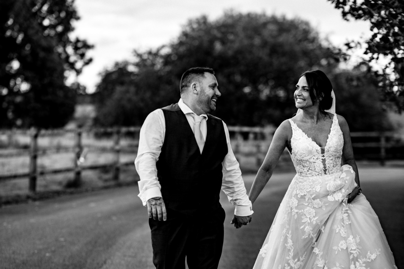 Bride and groom walking round the grounds