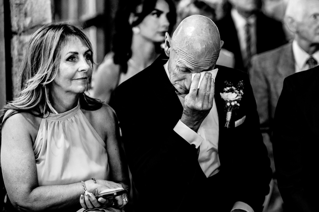 Father of groom crying