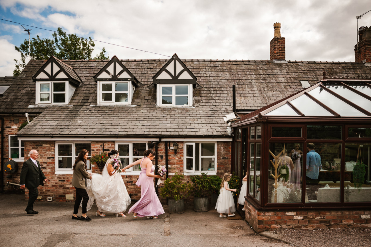 Rylands Farmhouse Wedding 13 Bridal party making their way to the wedding tipi