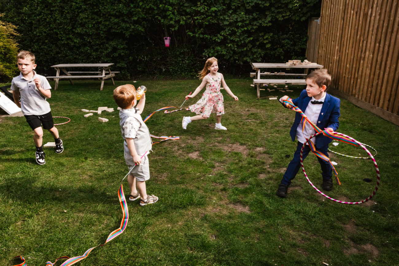 Rylands Farmhouse Wedding 26 kids playing at Rylands Farmhouse
