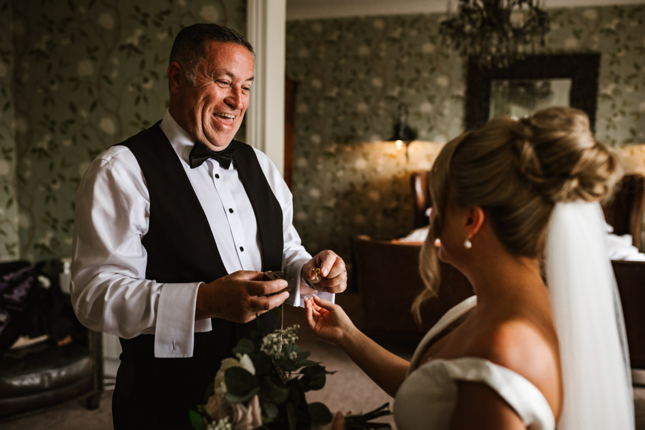 Bride giving her dad a present