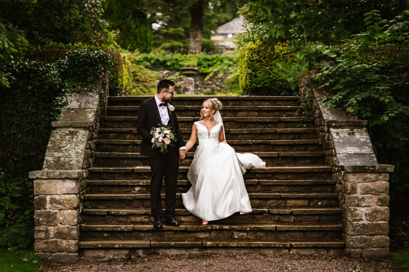 Walking down the steps at eaves Hall