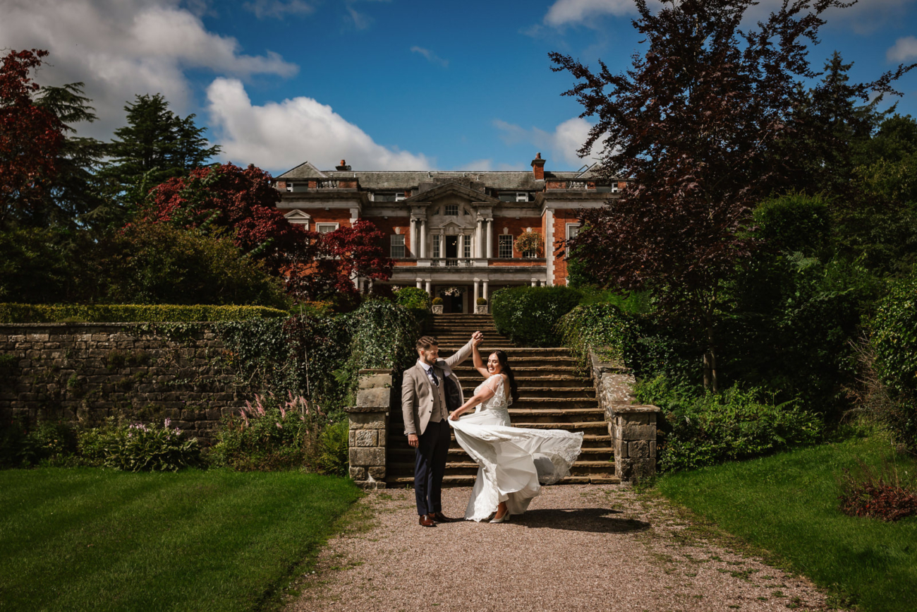 Dancing in front of eaves hall