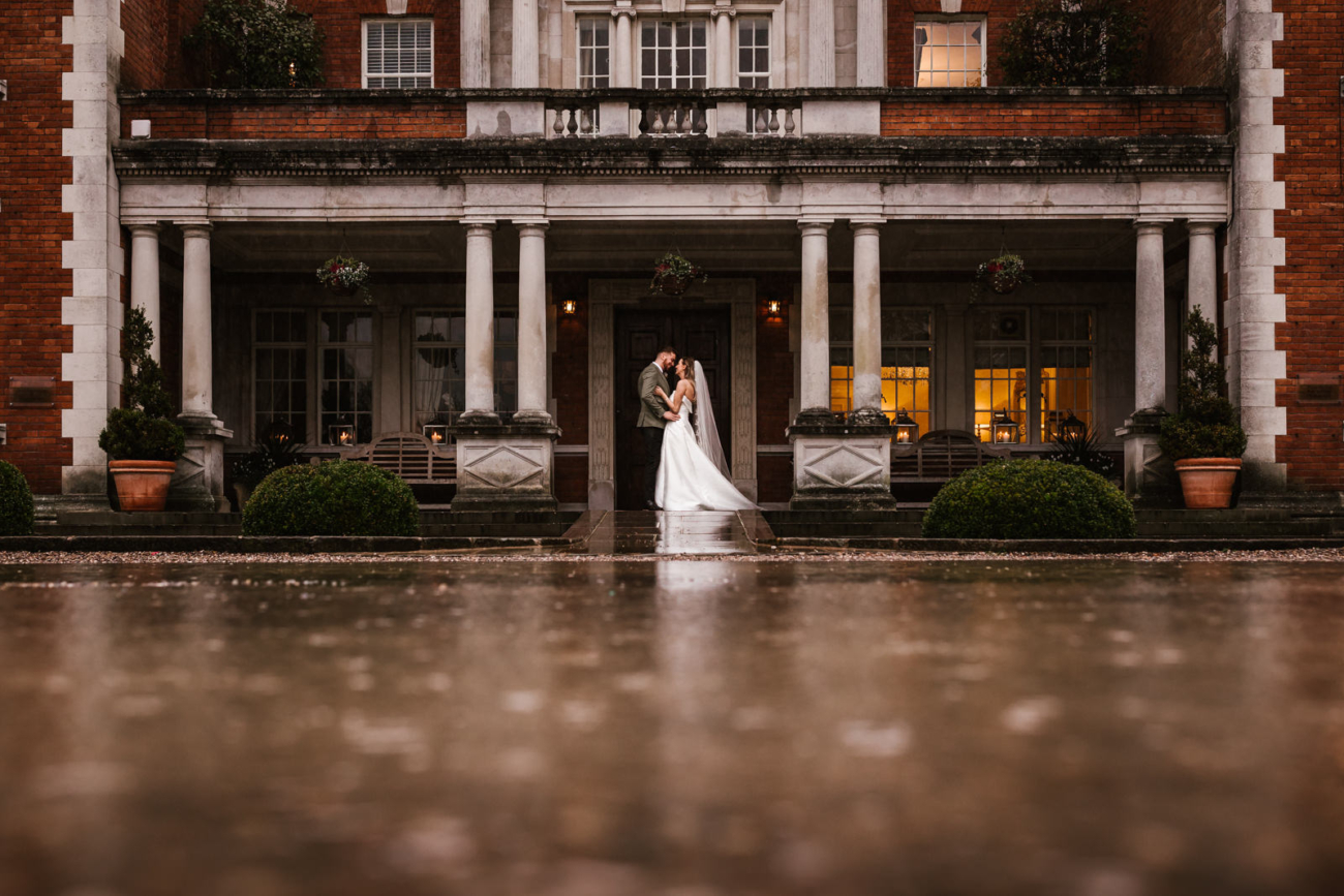 Rainy wedding at eaves hall