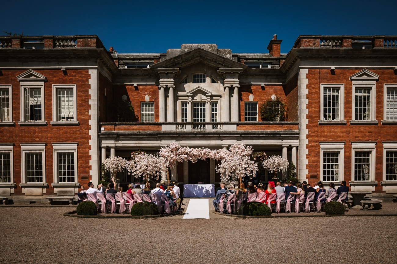 Outdoor wedding ceremony at eaves hall