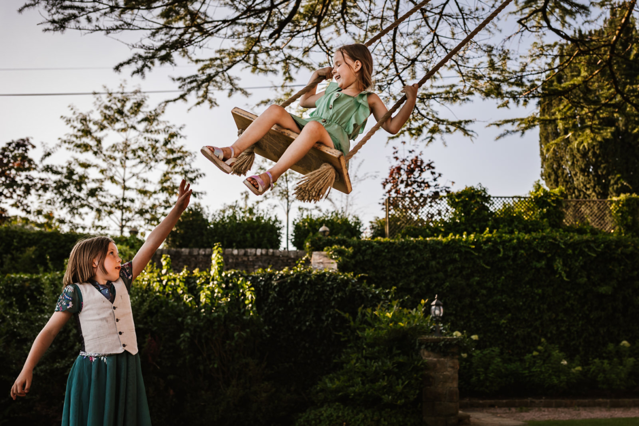 Children on the swing at Eaves Hall